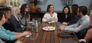 group of people gathered around table