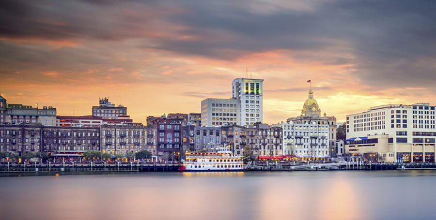 Savannah Georgia USA, skyline of historic downtown at sunset with illuminated buildings